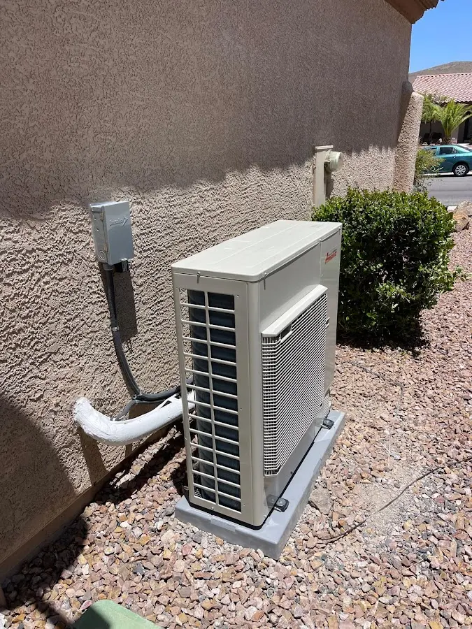Residential air conditioning condenser unit in Hope